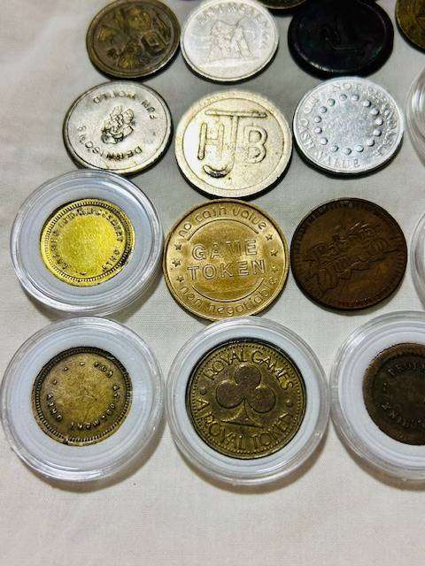 20 x Tokens all different from new to VF nice lot capsules included one bid takes all