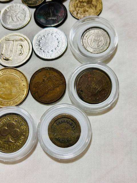 20 x Tokens all different from new to VF nice lot capsules included one bid takes all