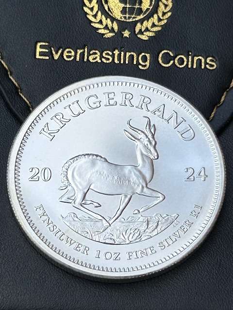 2024 KRUGERRAND 1OZ FINE SILVER IN CAPTULE AND LEATHER COIN POUCH SPOTLESS COIN TO GRADE SEE IMAGES