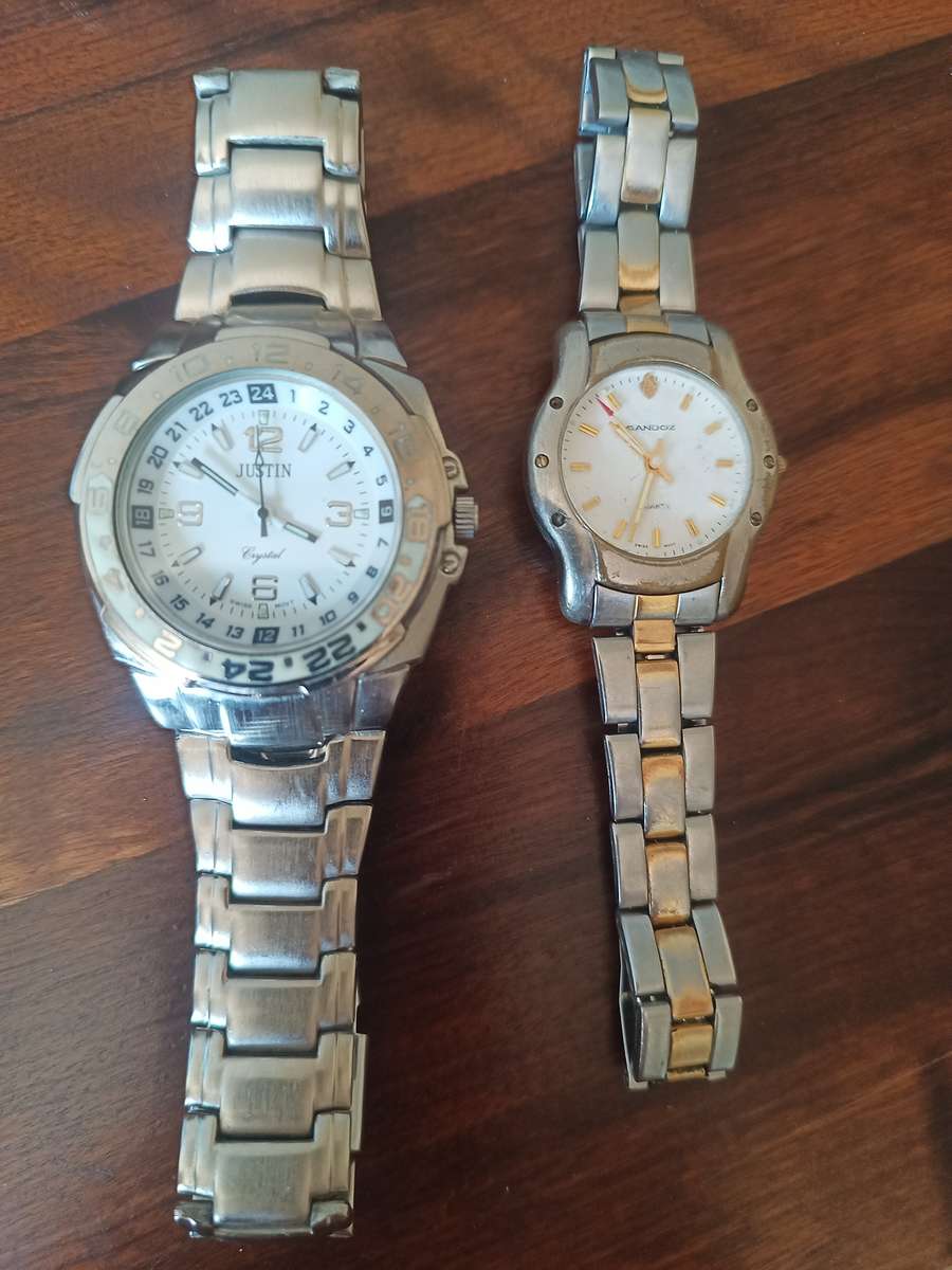 Justin men's watch and a Sandoz ladies watch