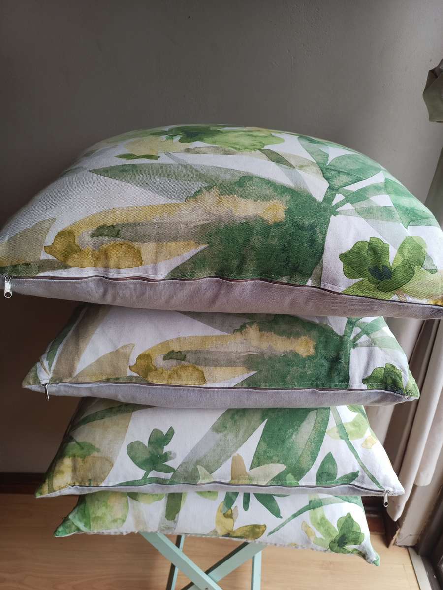 Four stunning scattered cushions