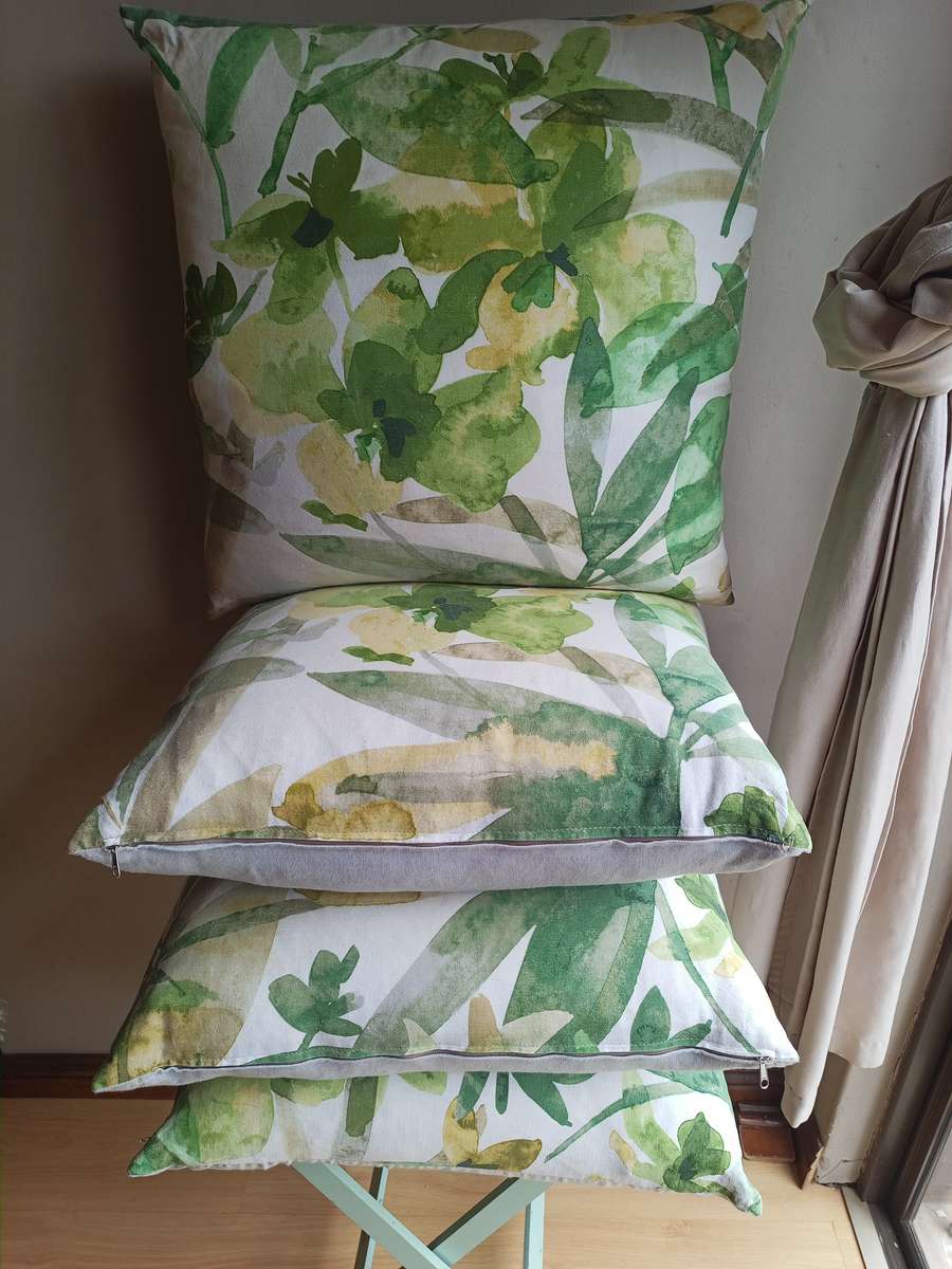 Four stunning scattered cushions
