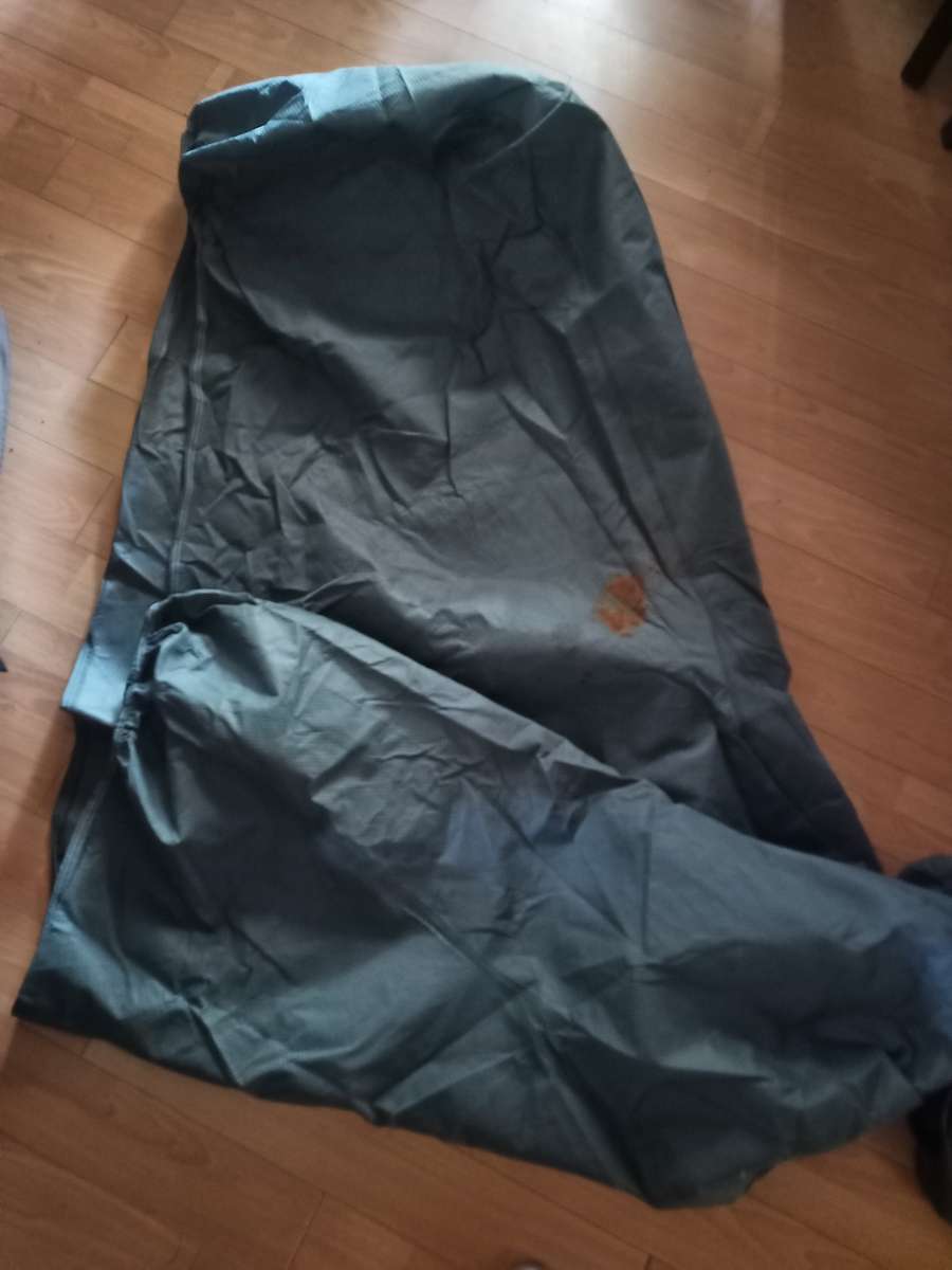 Motorcycle protective cover in bag