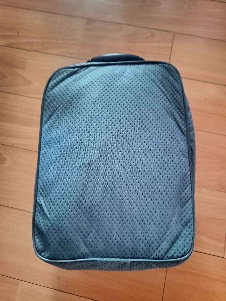 Motorcycle protective cover in bag