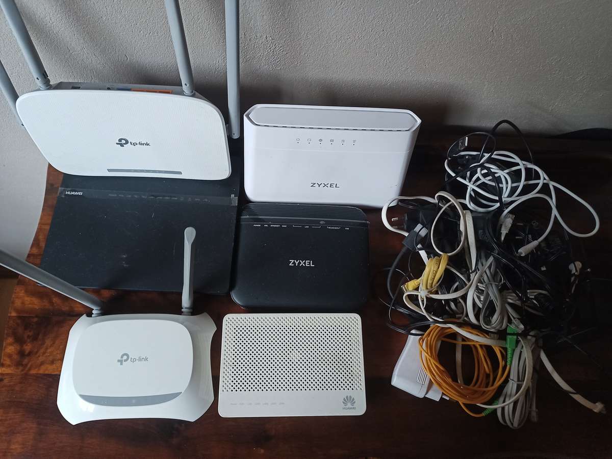 Lot of various Routers and power cables