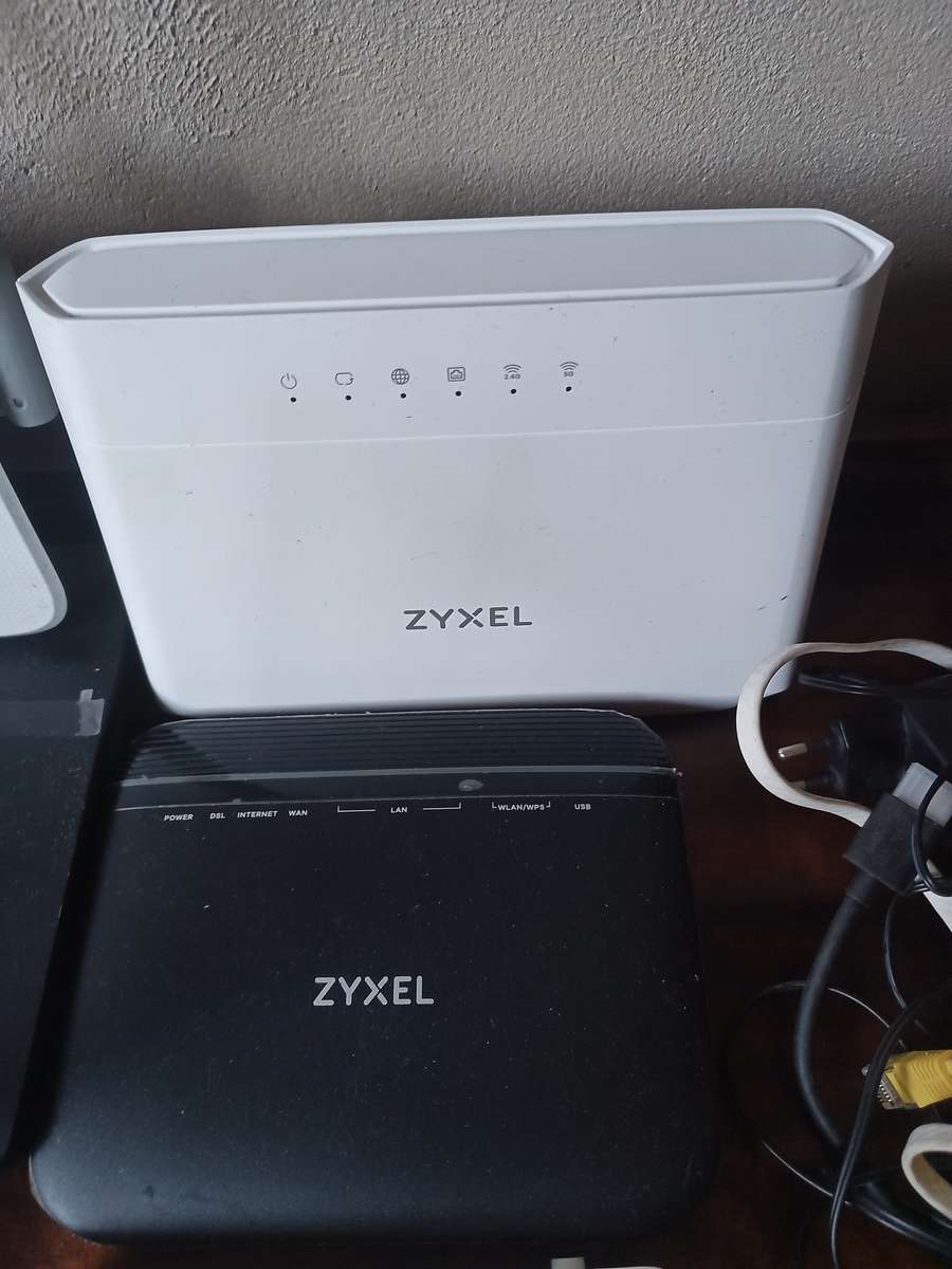 Lot of various Routers and power cables