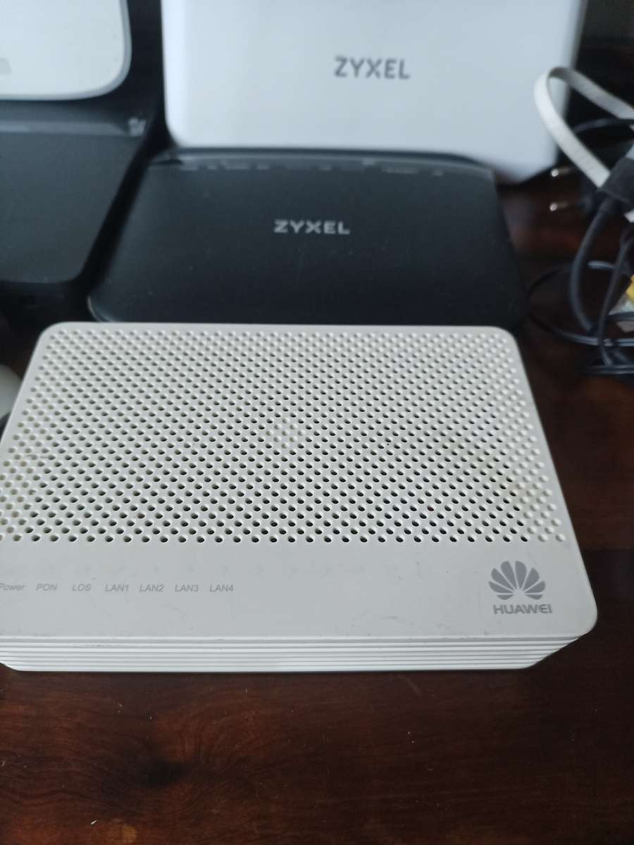 Lot of various Routers and power cables