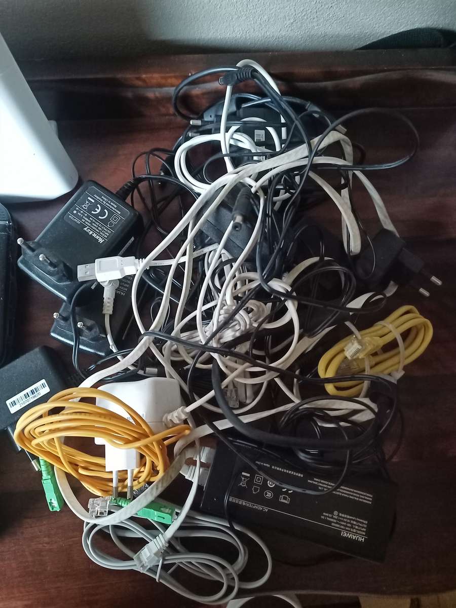 Lot of various Routers and power cables