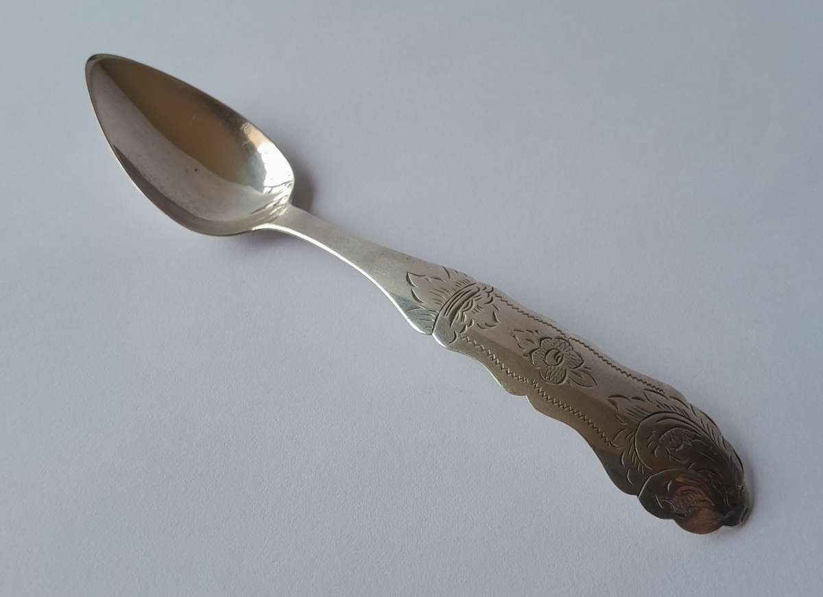 An 1858 Dutch hallmarked solid silver spoon. 833 silver.