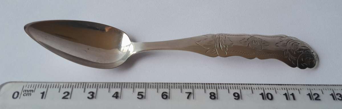 An 1858 Dutch hallmarked solid silver spoon. 833 silver.