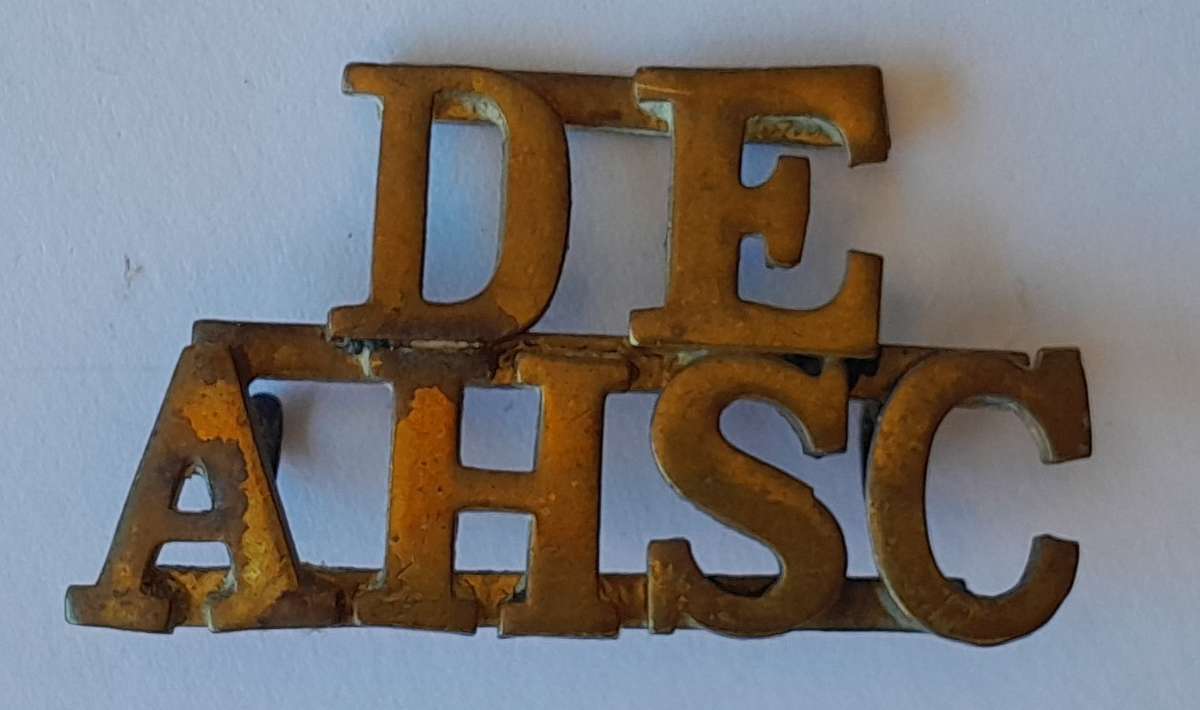 Early DEAHSC Brass Shoulder Title. Lugs Intact.