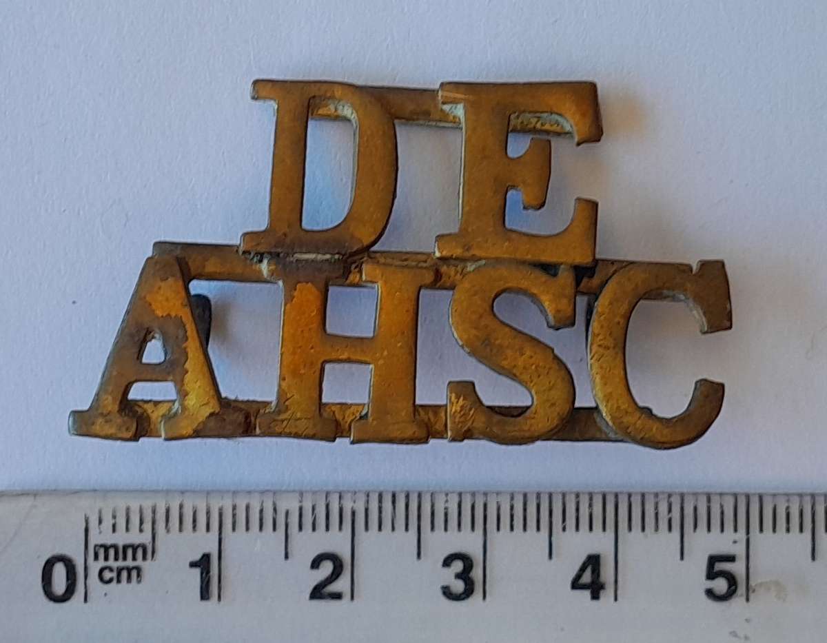Early DEAHSC Brass Shoulder Title. Lugs Intact.