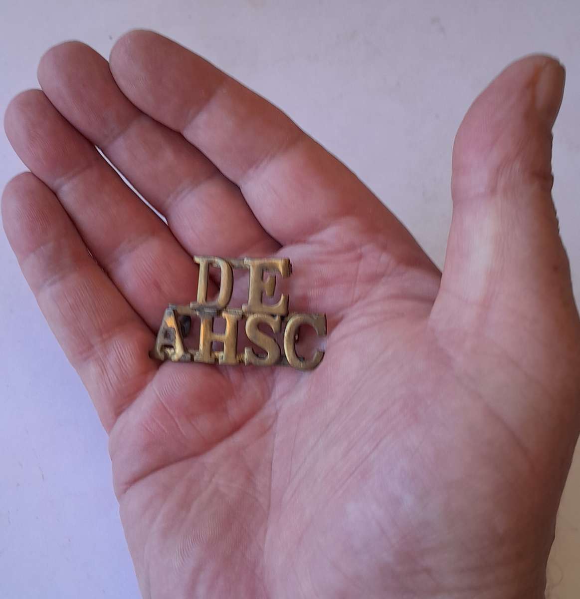 Early DEAHSC Brass Shoulder Title. Lugs Intact.