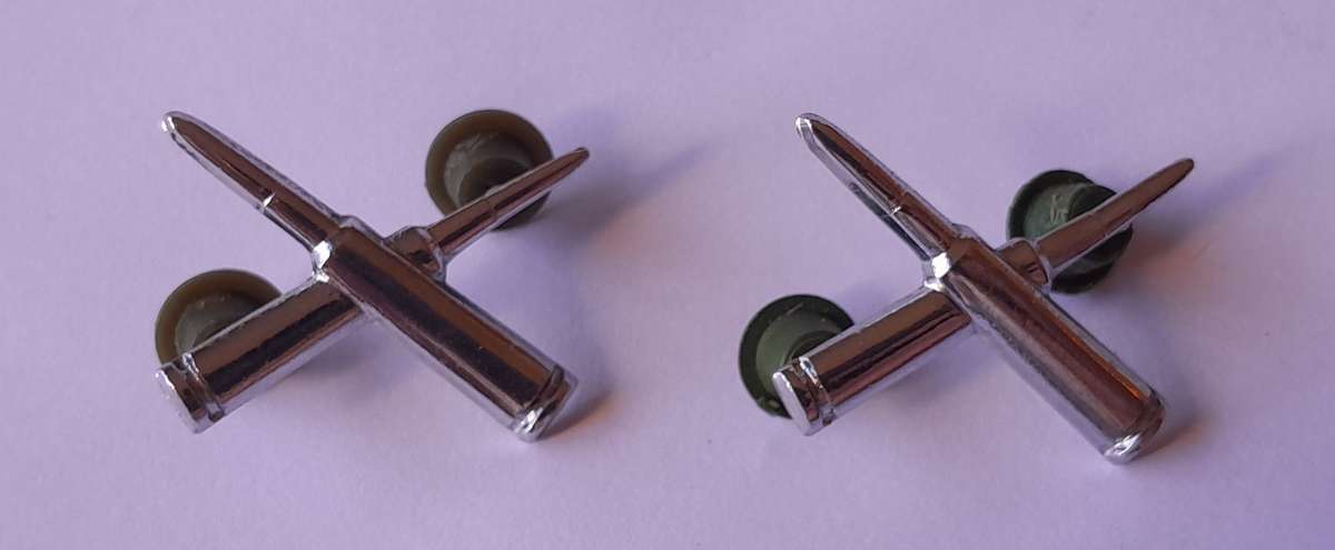 Pair SADF Ammunition Corps Collar Badges.  Pins Intact.