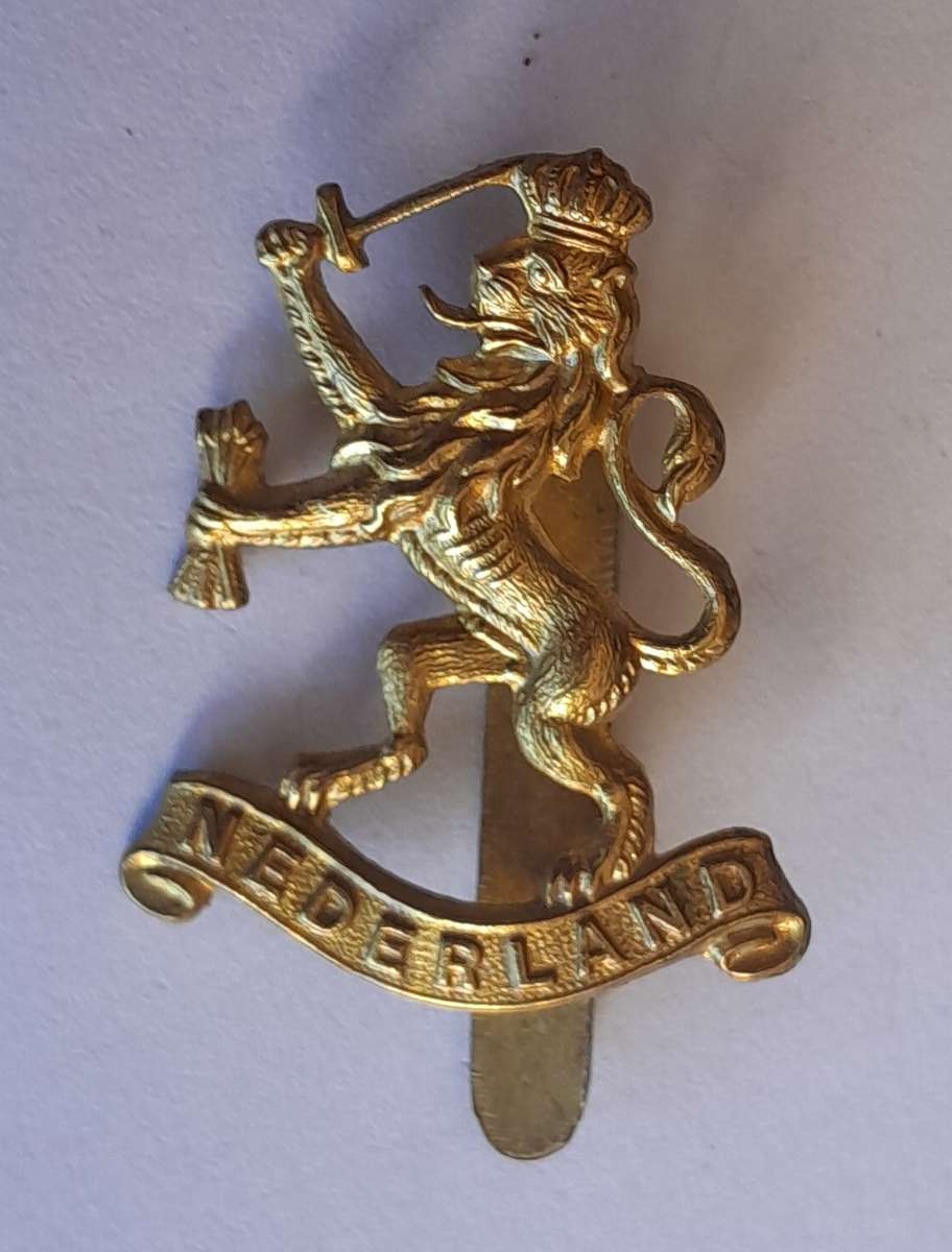 WW2 Netherlands Dutch Army in Exile Cap Badge.  JR Gaunt. Slider Intact.