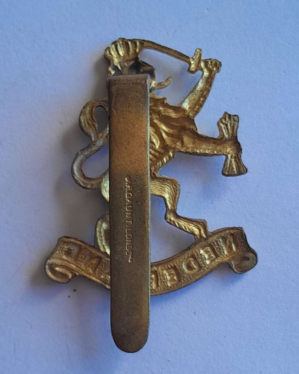 WW2 Netherlands Dutch Army in Exile Cap Badge.  JR Gaunt. Slider Intact.