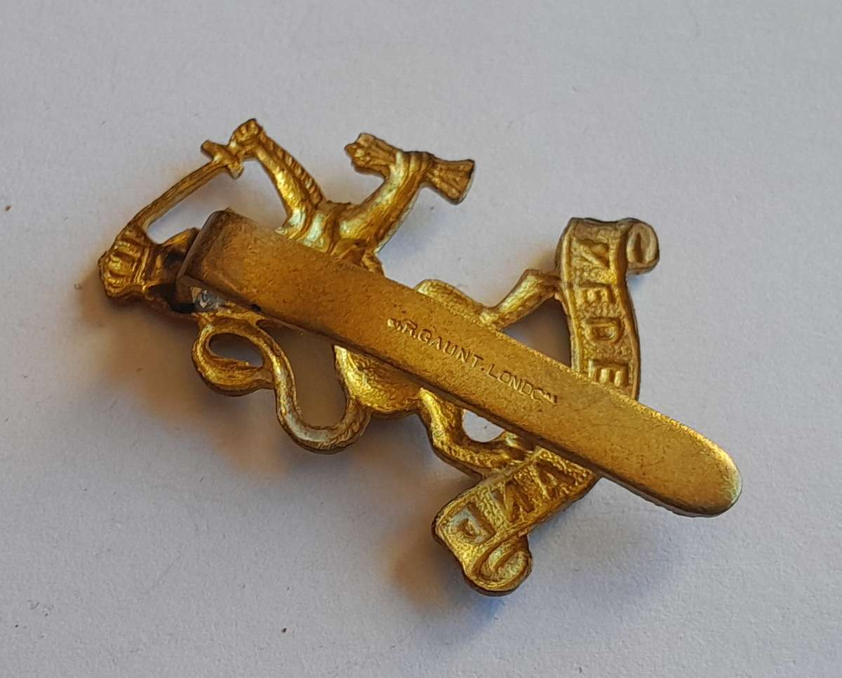 WW2 Netherlands Dutch Army in Exile Cap Badge.  JR Gaunt. Slider Intact.