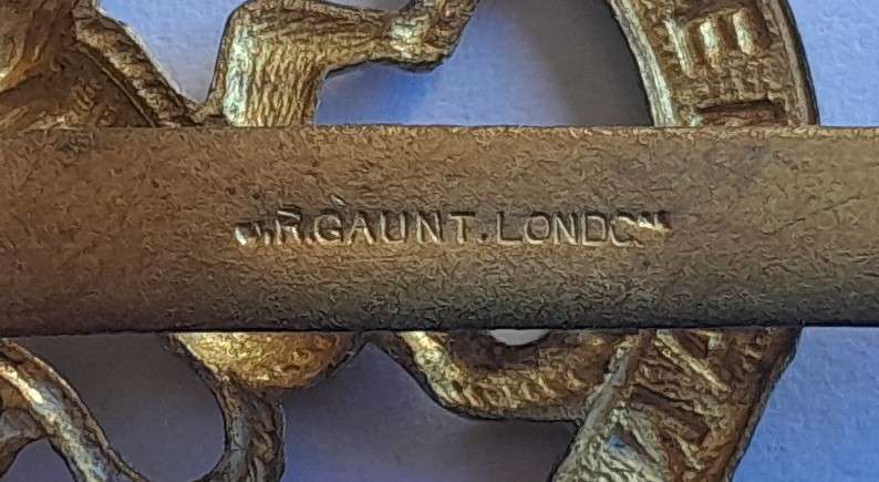 WW2 Netherlands Dutch Army in Exile Cap Badge.  JR Gaunt. Slider Intact.