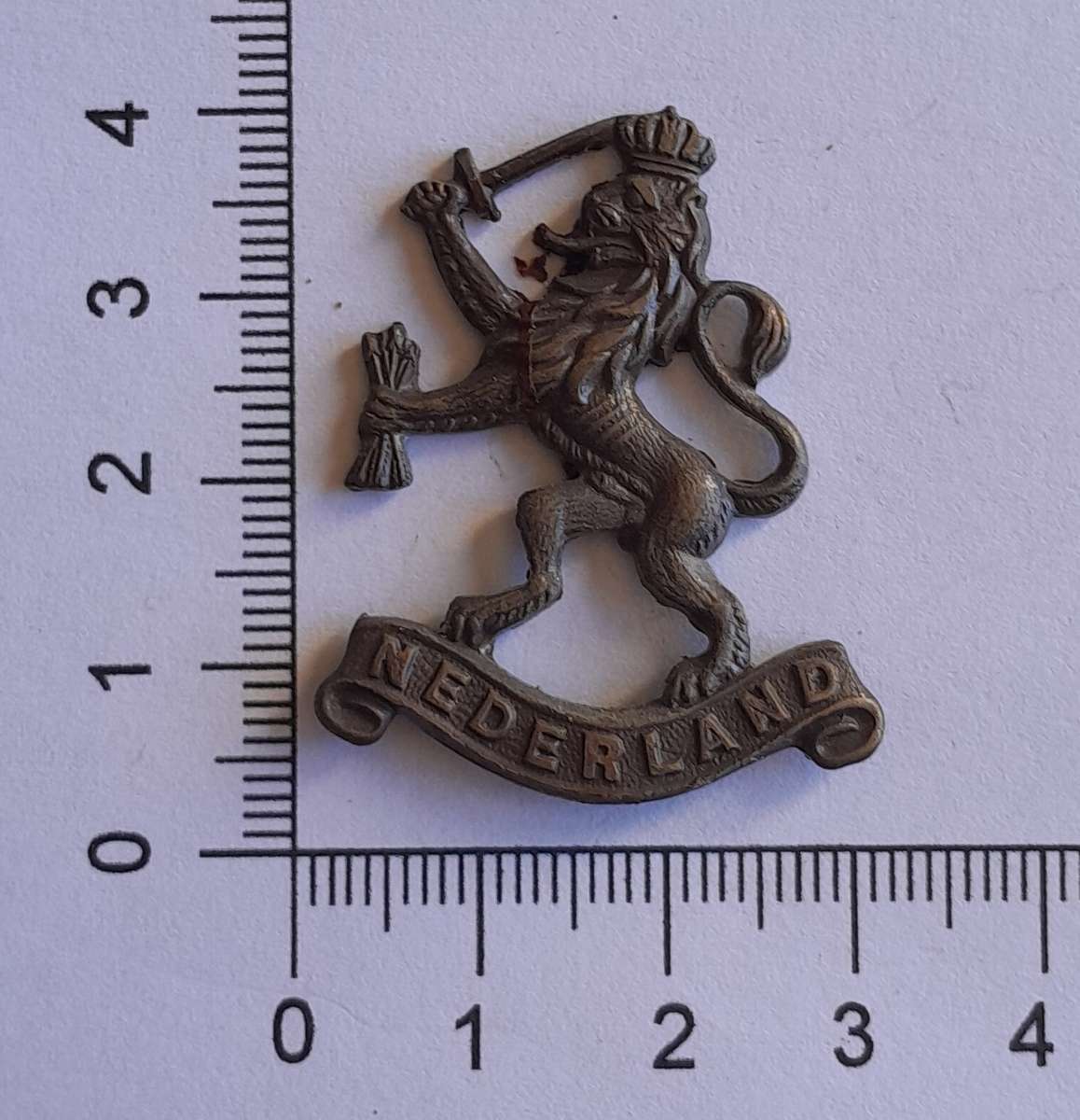 WW2 Netherlands Dutch Army in Exile Cap Badge.  JR Gaunt. No Lugs.