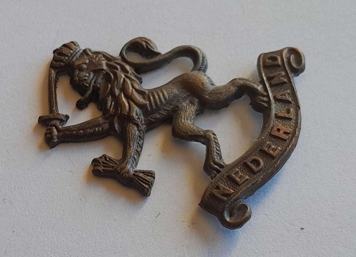 WW2 Netherlands Dutch Army in Exile Cap Badge.  JR Gaunt. No Lugs.