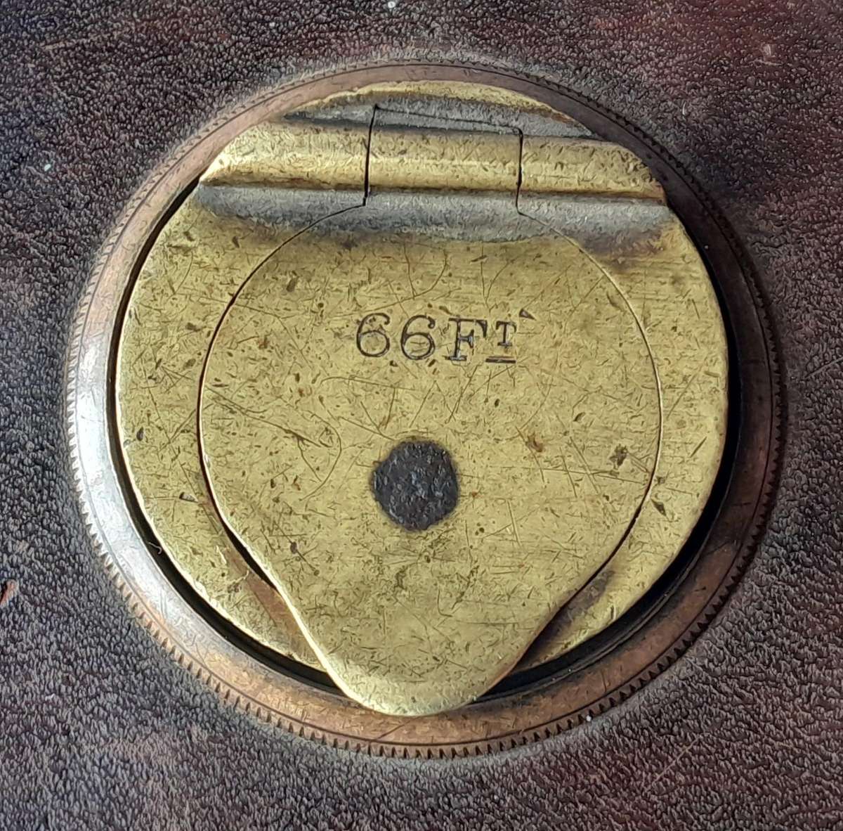 Antique Leather Cased 66ft Wind Up Measuring Tape with Brass Handle.