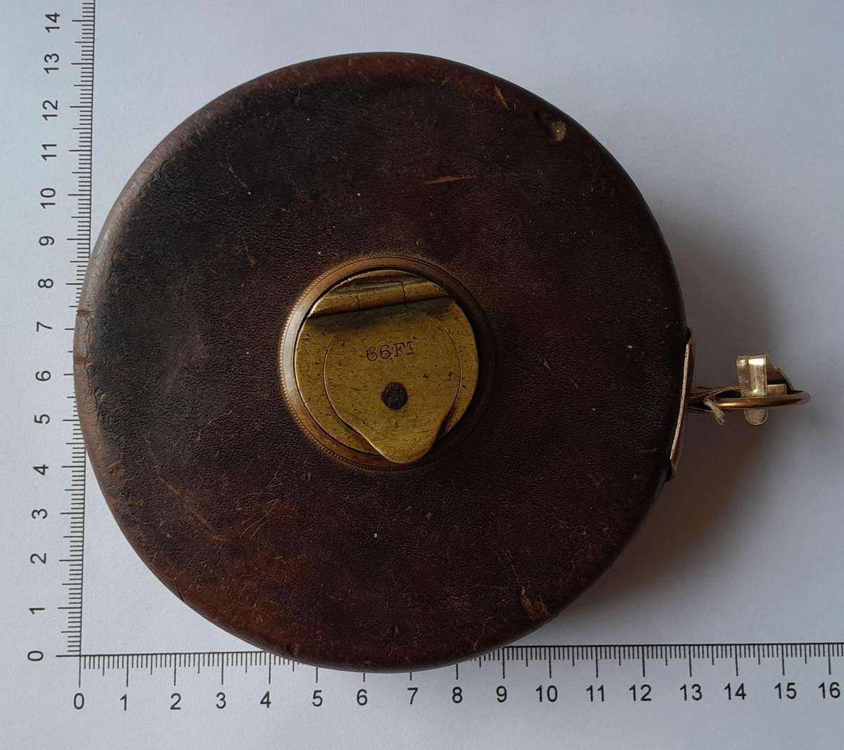 Antique Leather Cased 66ft Wind Up Measuring Tape with Brass Handle.
