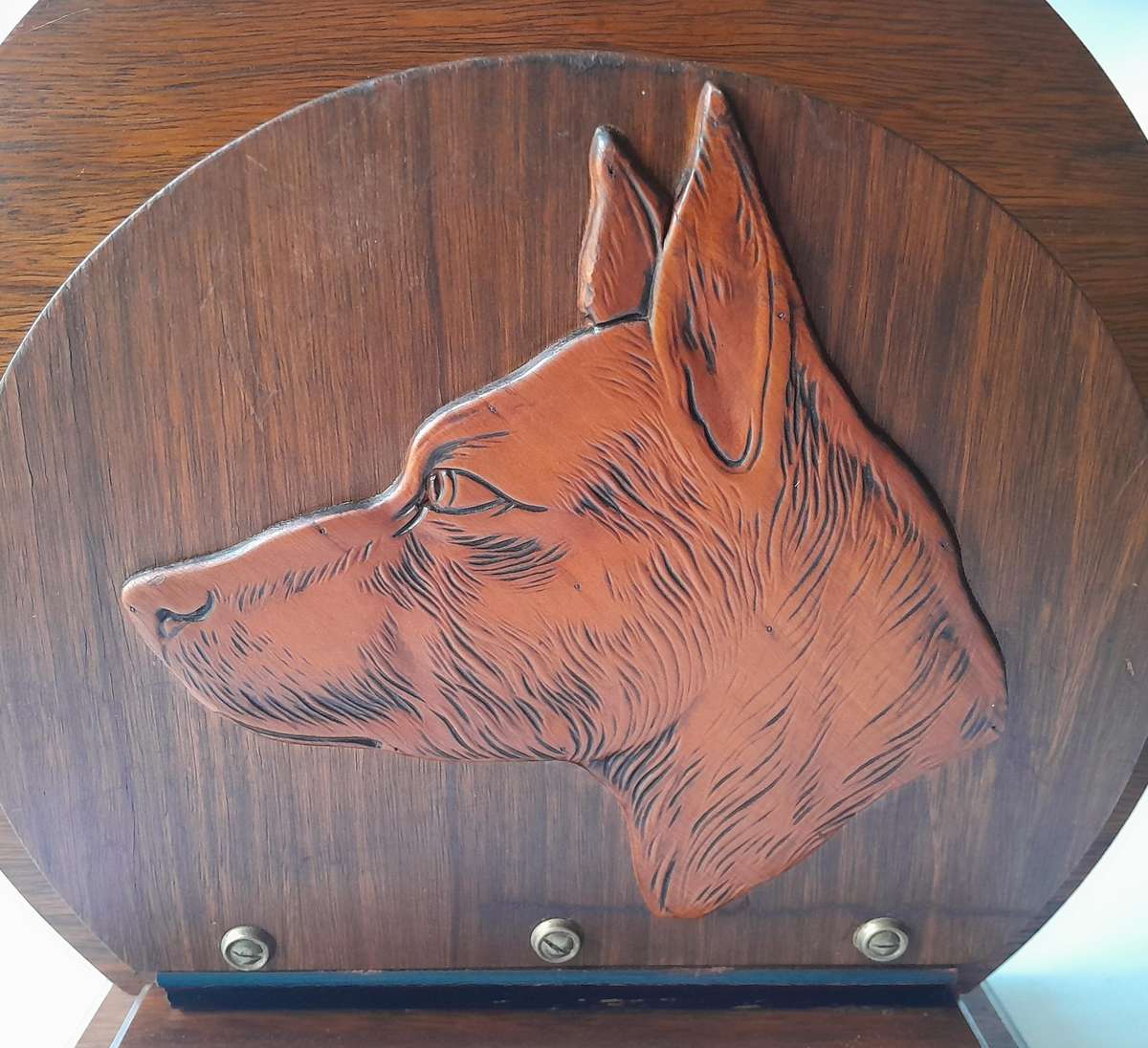 Austrian Art Deco Double-Sided Magazine Holder With Hand-Carved Dog Motifs.
