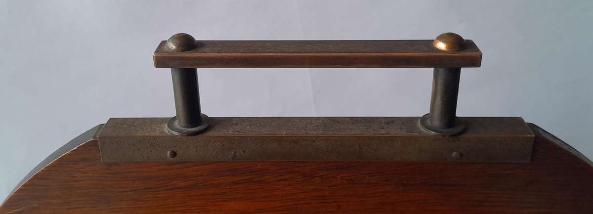 Austrian Art Deco Double-Sided Magazine Holder With Hand-Carved Dog Motifs.