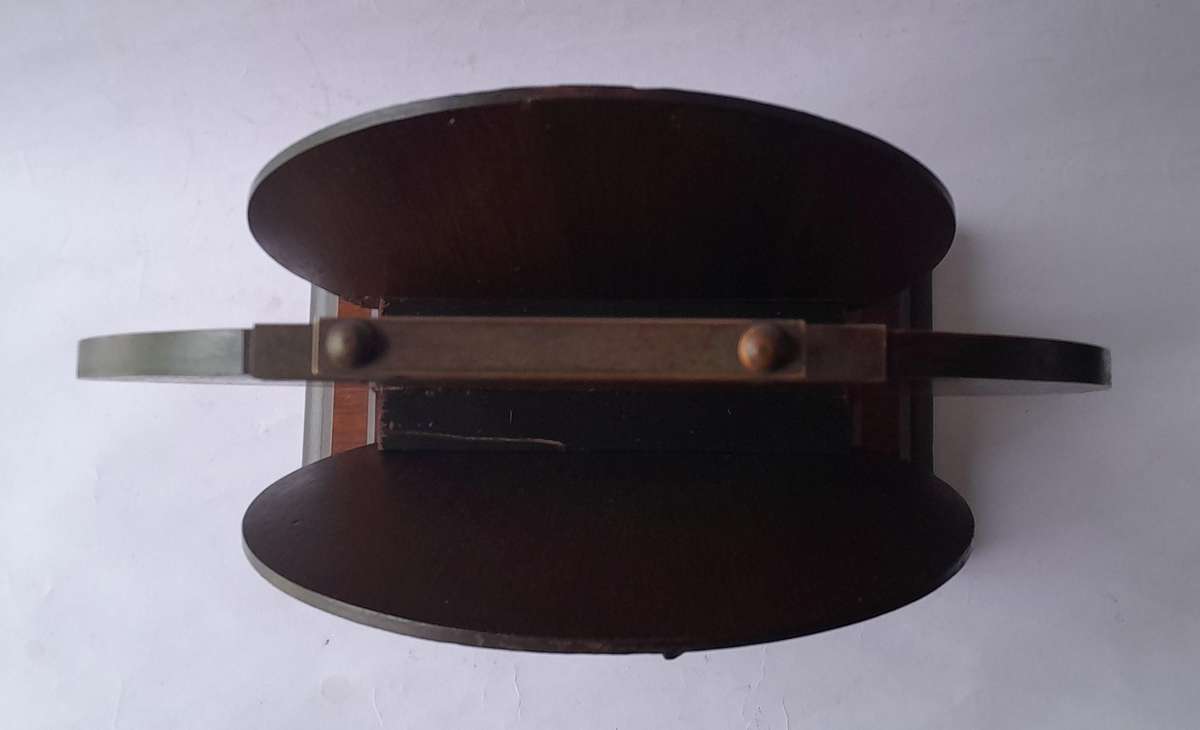 Austrian Art Deco Double-Sided Magazine Holder With Hand-Carved Dog Motifs.