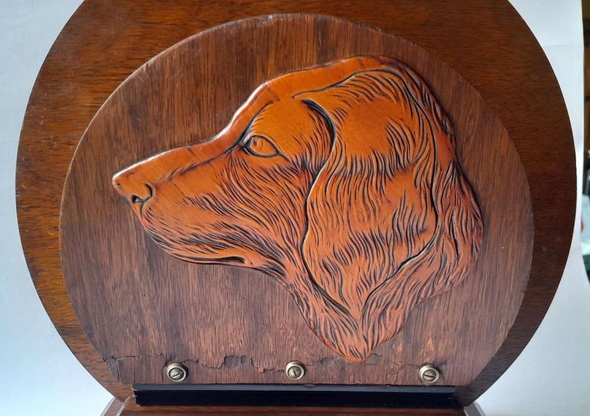 Austrian Art Deco Double-Sided Magazine Holder With Hand-Carved Dog Motifs.