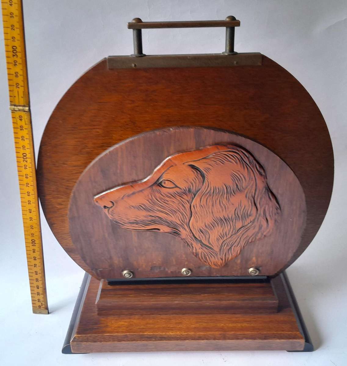 Austrian Art Deco Double-Sided Magazine Holder With Hand-Carved Dog Motifs.