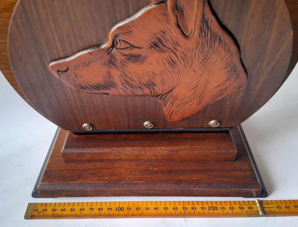 Austrian Art Deco Double-Sided Magazine Holder With Hand-Carved Dog Motifs.