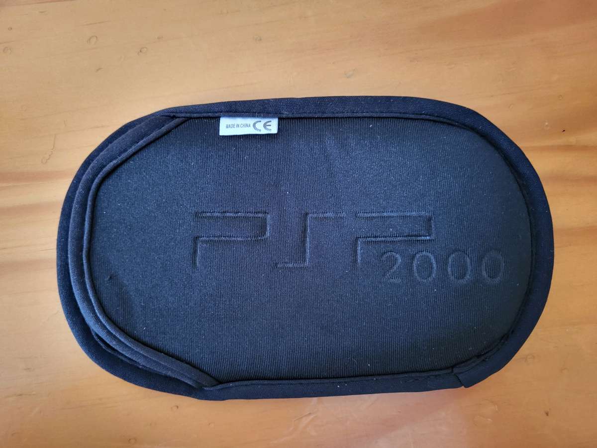 HUGE PSP BUNDLE | With Charger, Pouch, Memory Stick & 6 Games