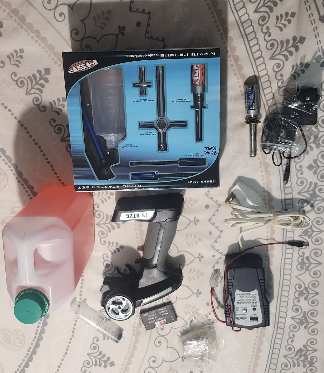 Fully functional Nitro RC Truck with FlySky 2.4ghz Remote and reciever. +lots of extras