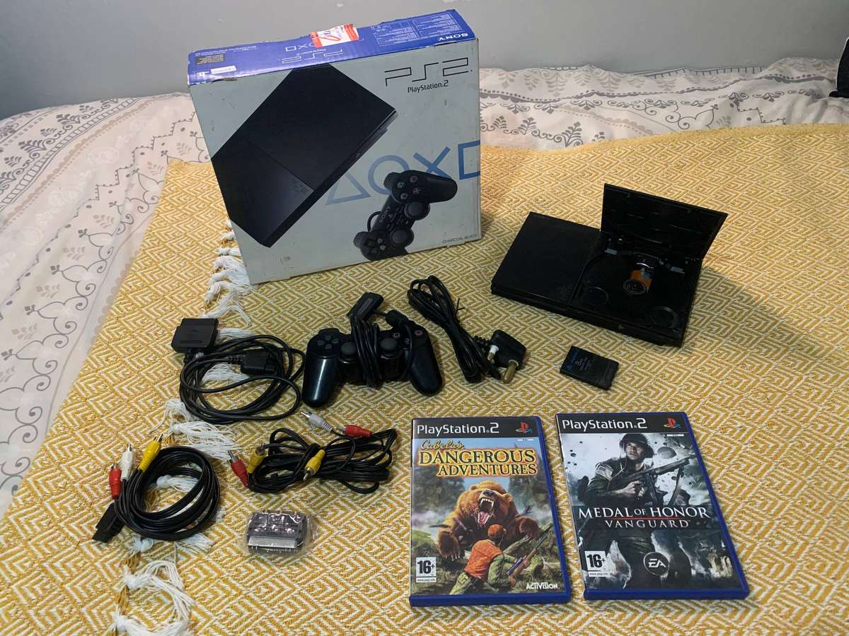 Boxed Playstasion 2 SCPH-90004 (Lady Owned) + extras