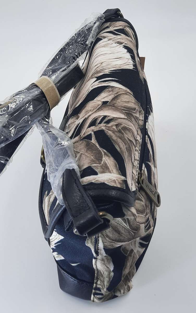 Stunning,Sophisticated And Trendy Shouder Sling Bag BY Vivace ! Black and white Protea design.