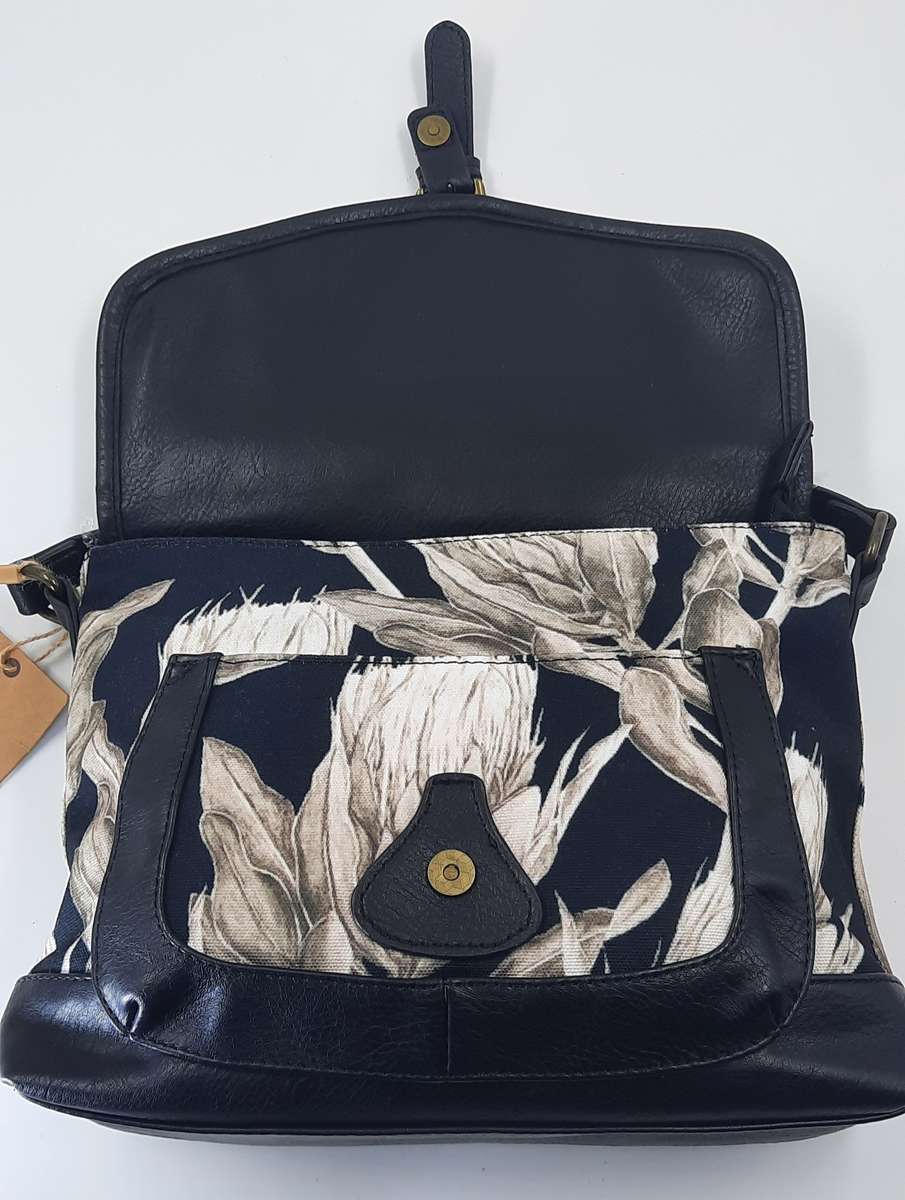 Stunning,Sophisticated And Trendy Shouder Sling Bag BY Vivace ! Black and white Protea design.