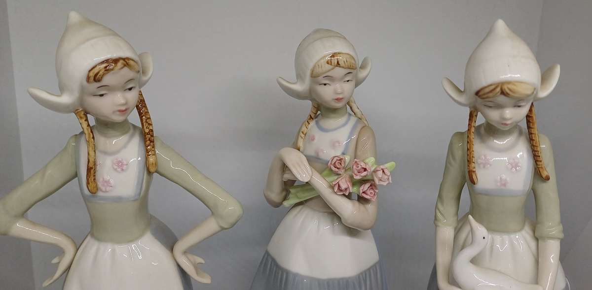 HERITAGE PORCELAIN  FIGURINES