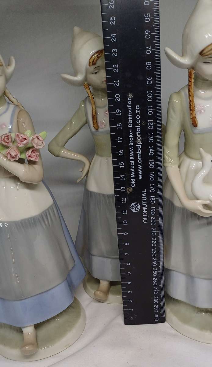 HERITAGE PORCELAIN  FIGURINES