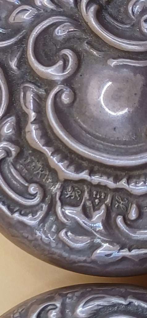 Two small marked silver and glass vanity jars lion facing left