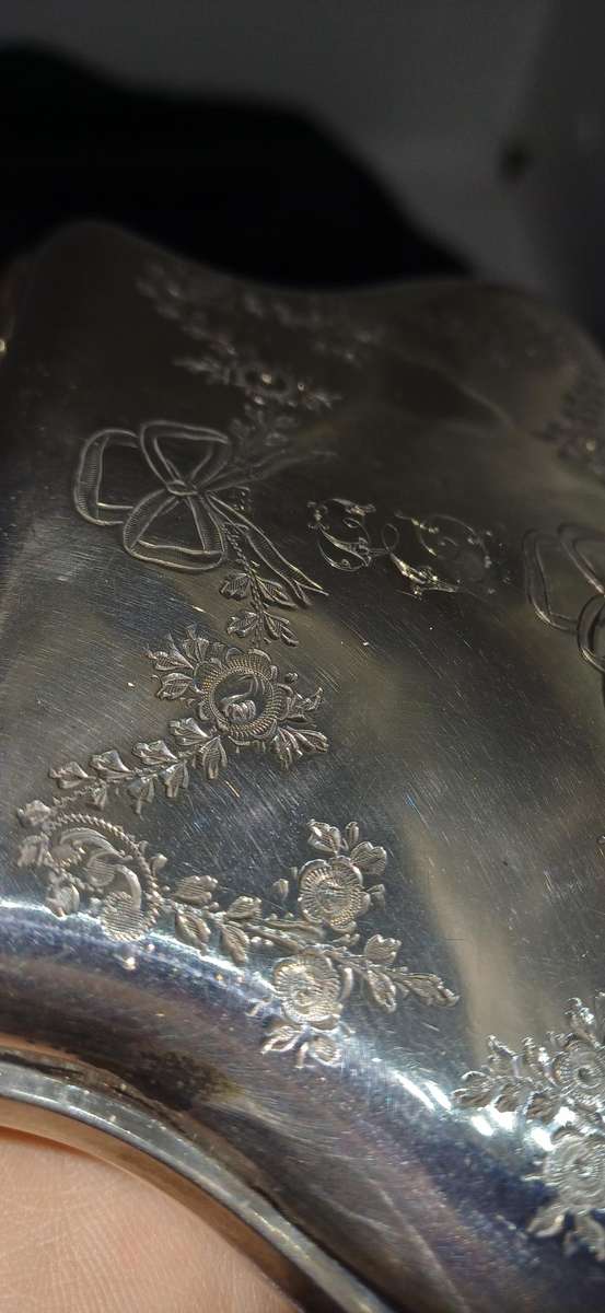 Antique silver coin purse marked with lion facing left