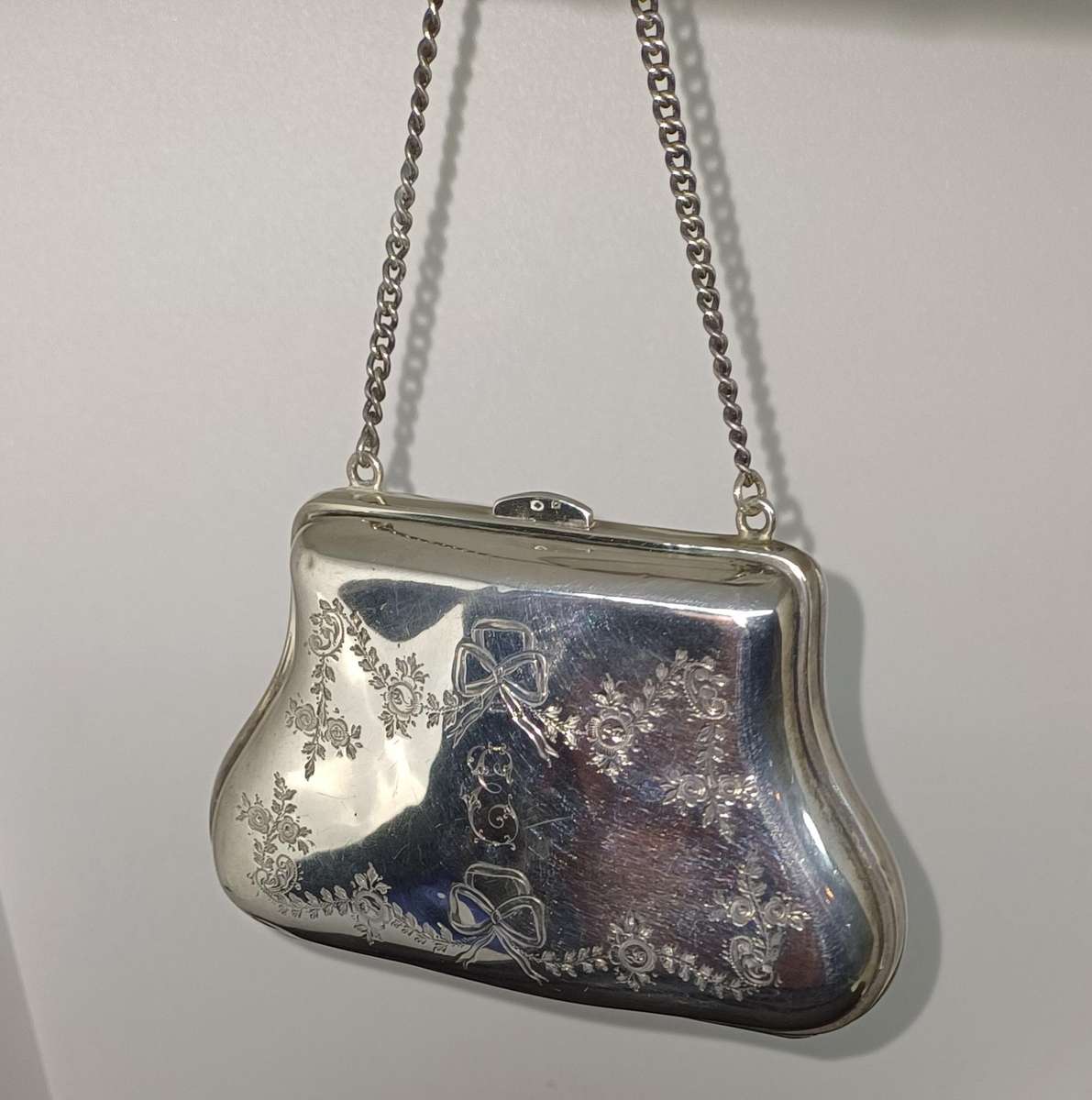 Antique silver coin purse marked with lion facing left