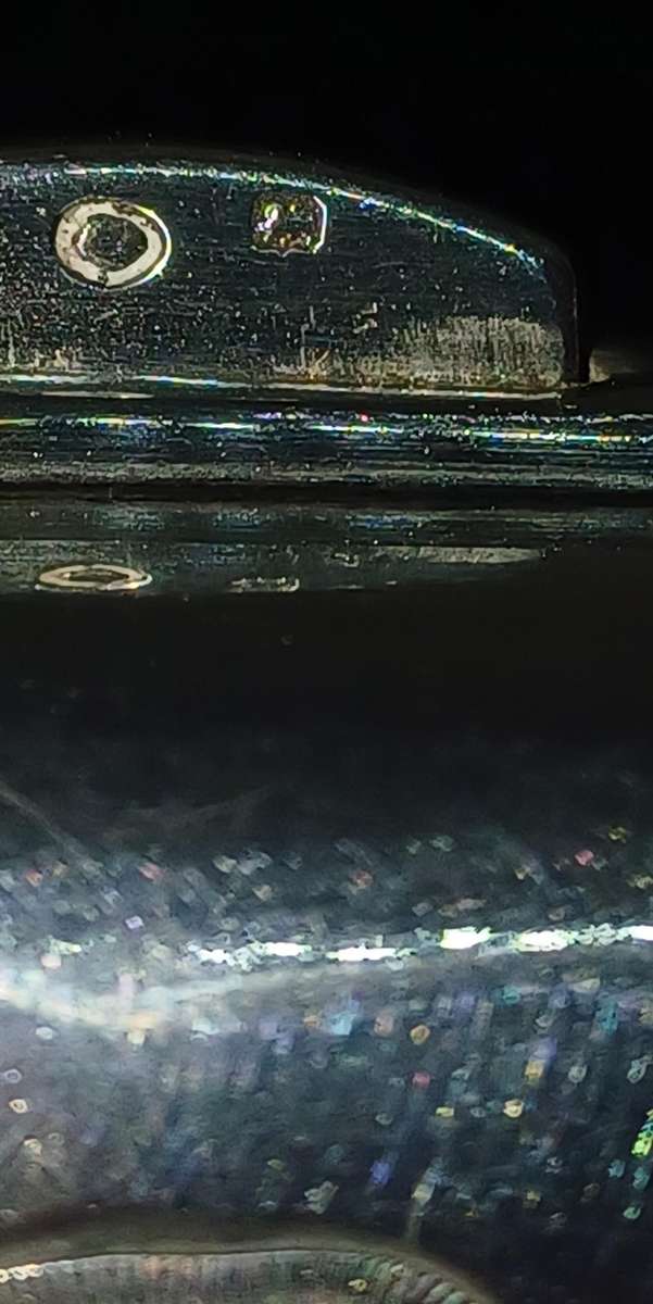 Antique silver coin purse marked with lion facing left