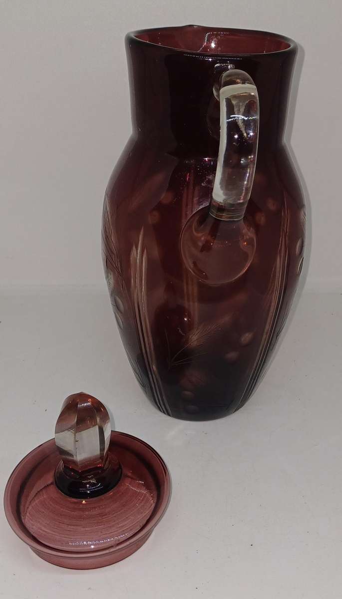 Vintage Ruby red cutglass pitcher with lid