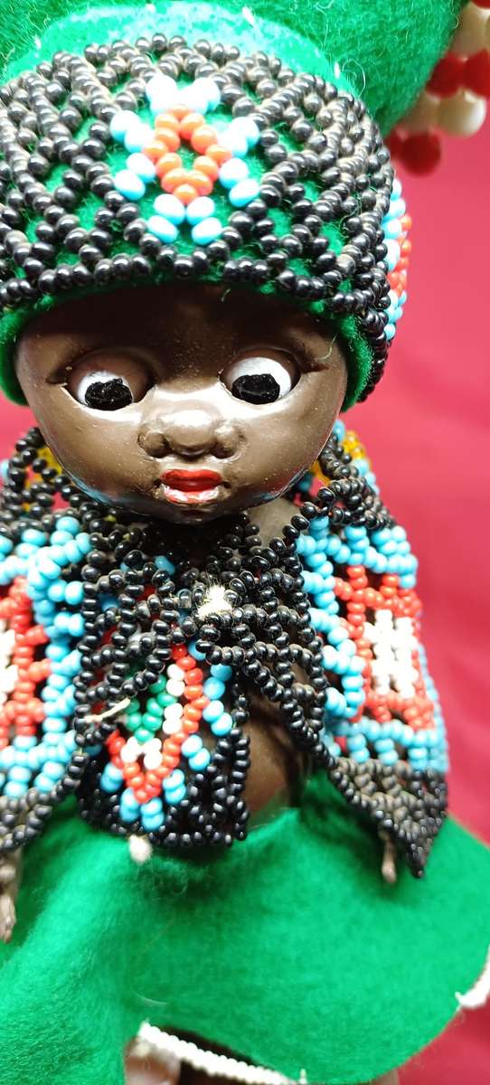 Vintage celluloid beaded dolls