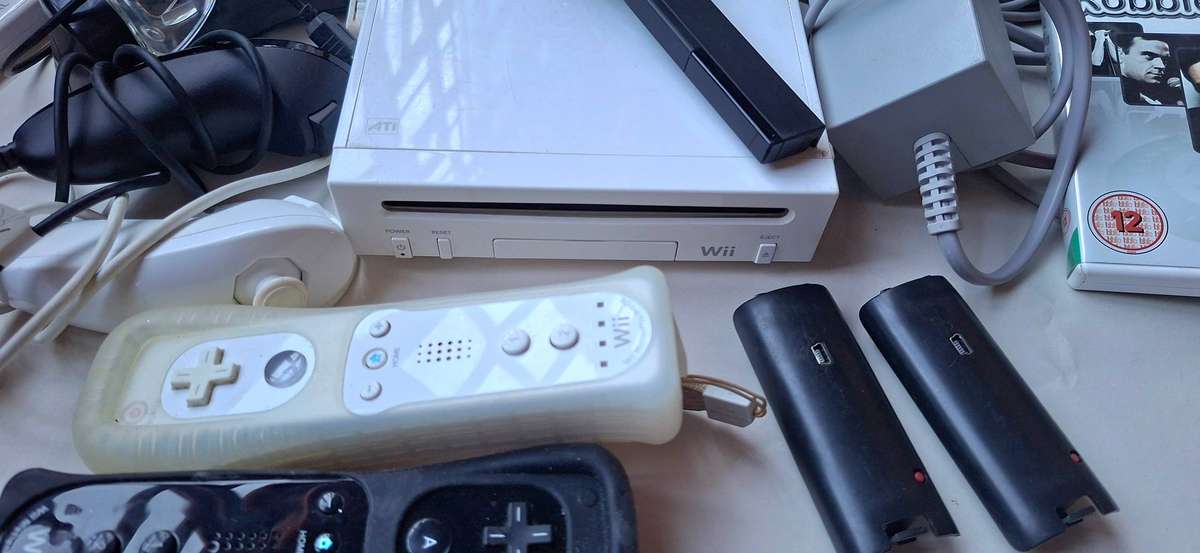 Nintendo Wii with games and consoles