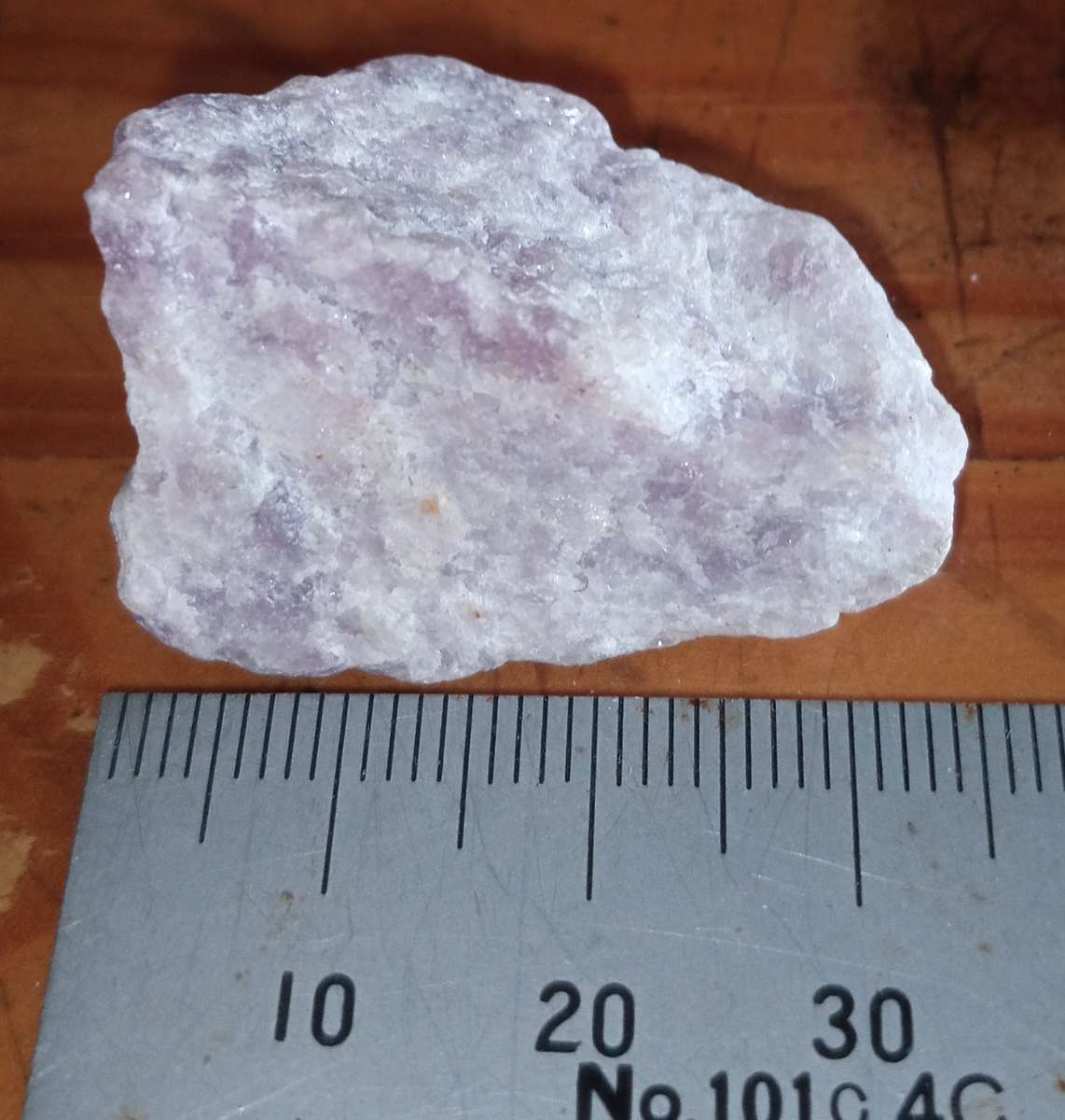 Rough Lepidolite associated with the third eye chakra and is thought to be a stone of transition