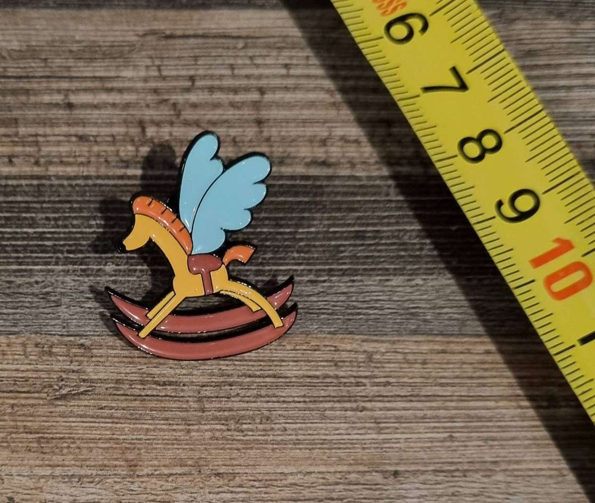 Rocking Horse Fly - Alice in Wonderland Enamel Pin
