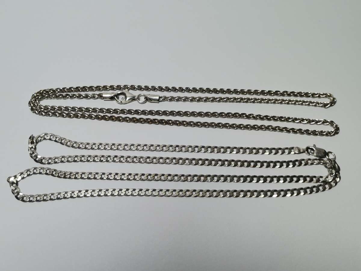 TWO 925 SILVER CHAINS FOR ONE BID. CLASPS BROKEN. 18 GRAMS TOTAL.