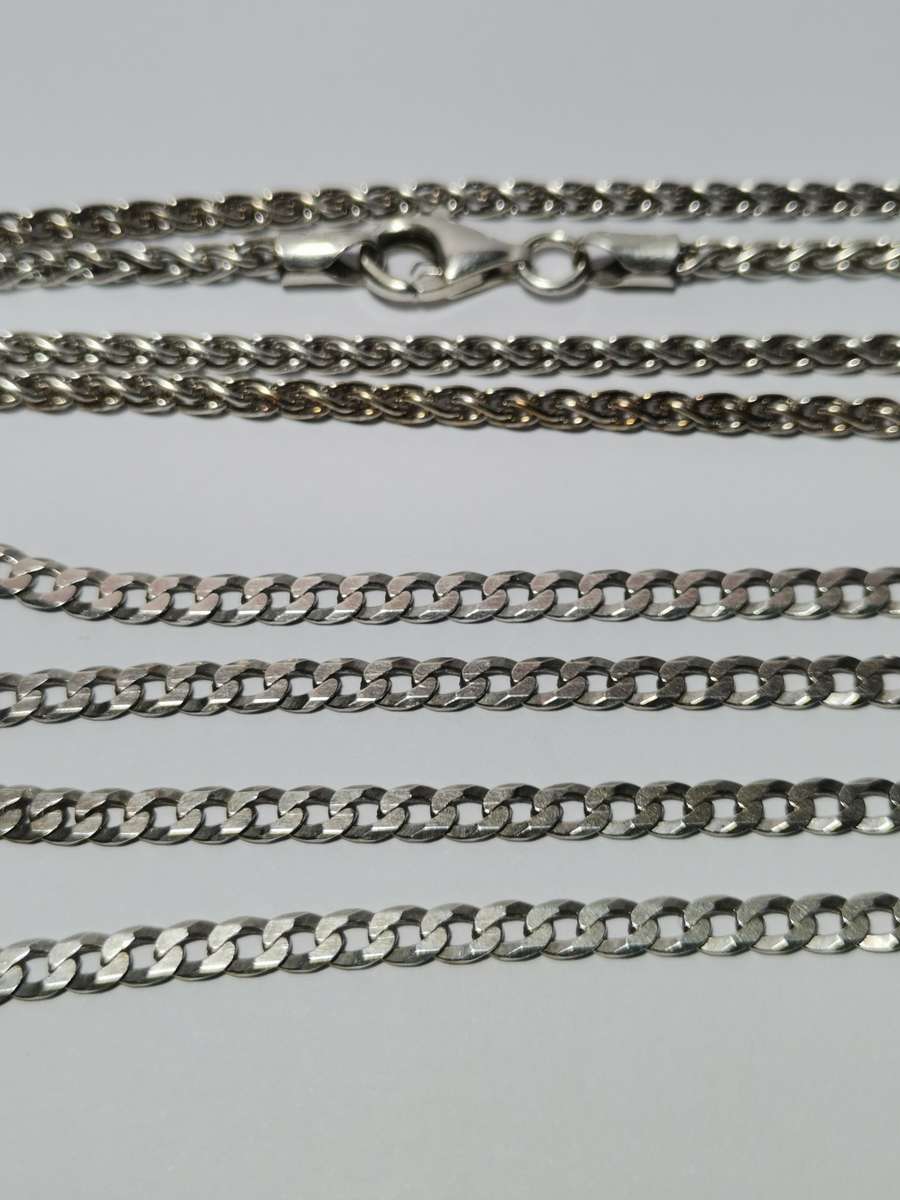 TWO 925 SILVER CHAINS FOR ONE BID. CLASPS BROKEN. 18 GRAMS TOTAL.